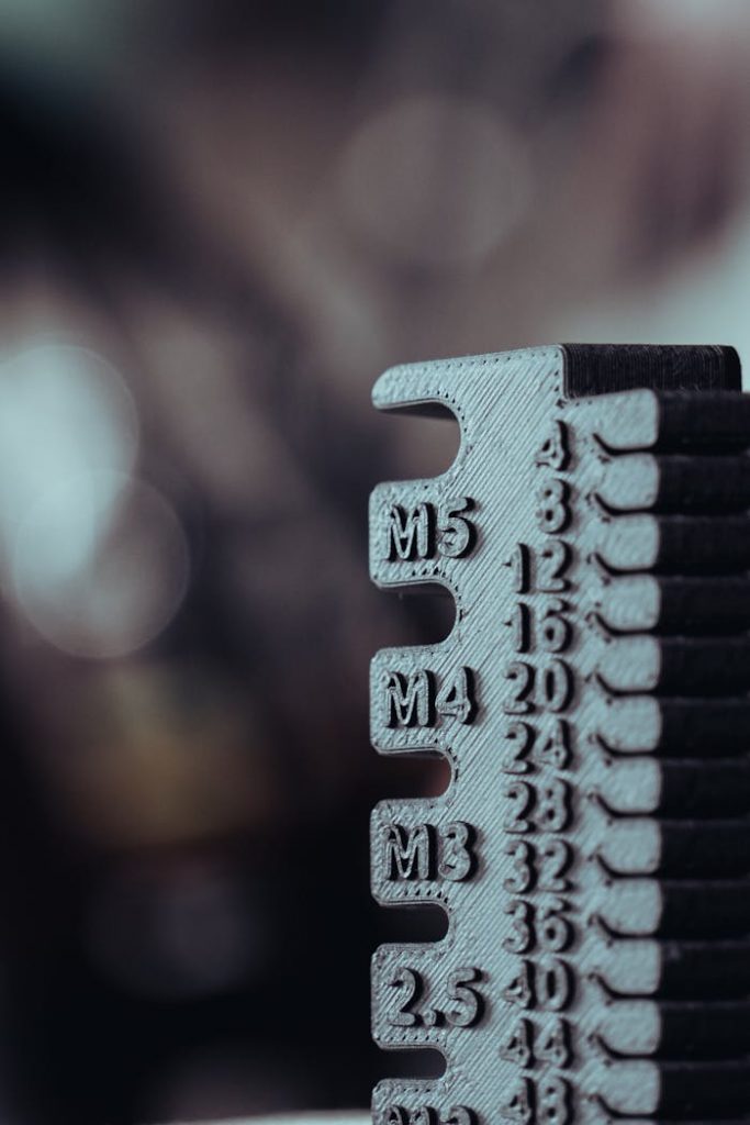 pexels photo 15598486 A detailed close-up of a metal measurement device with engraved numbers, ideal for engineering themes.